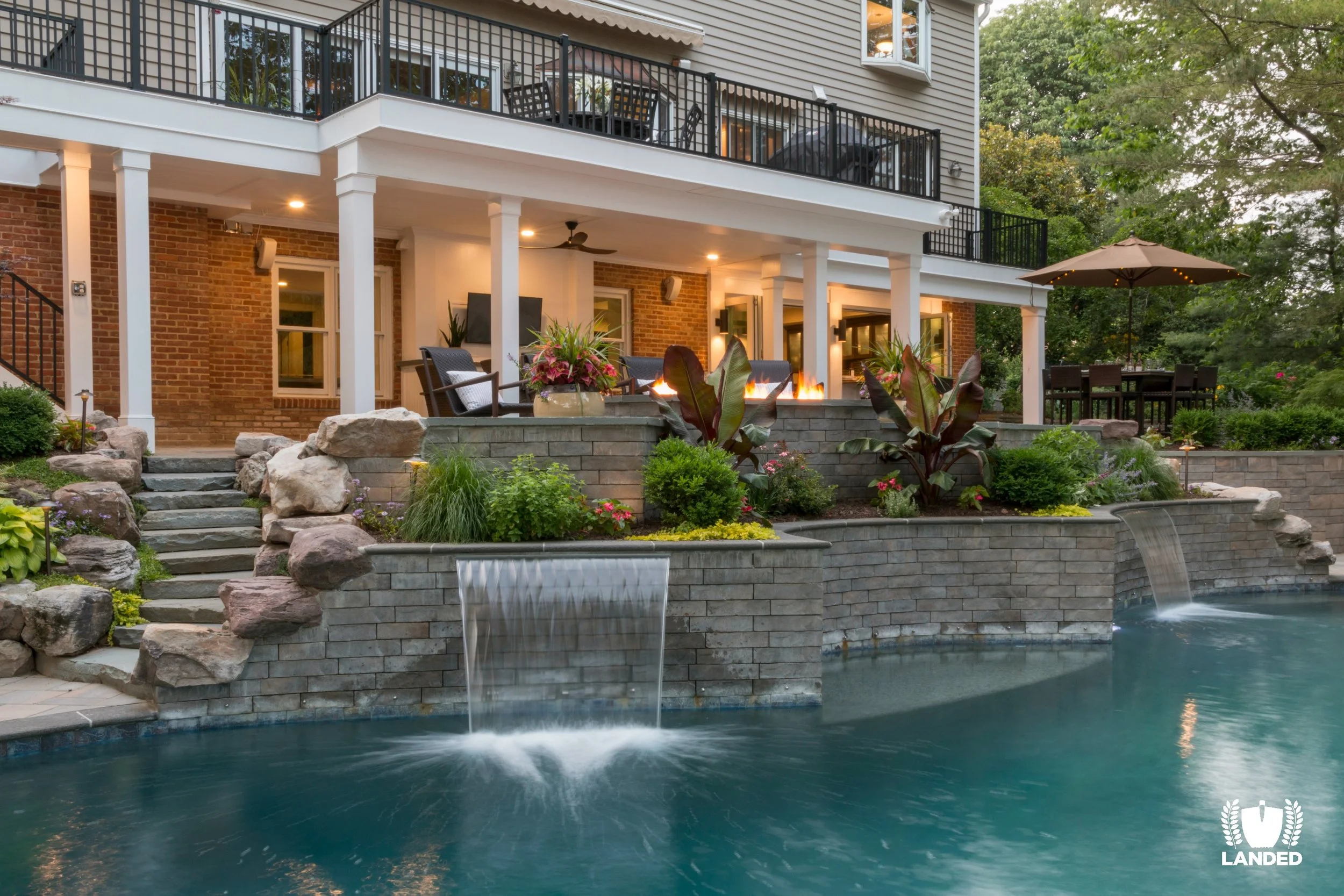 water feature in backyard with waterfall