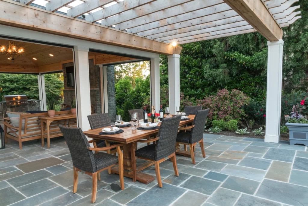 dining table in backyard patio and pergola
