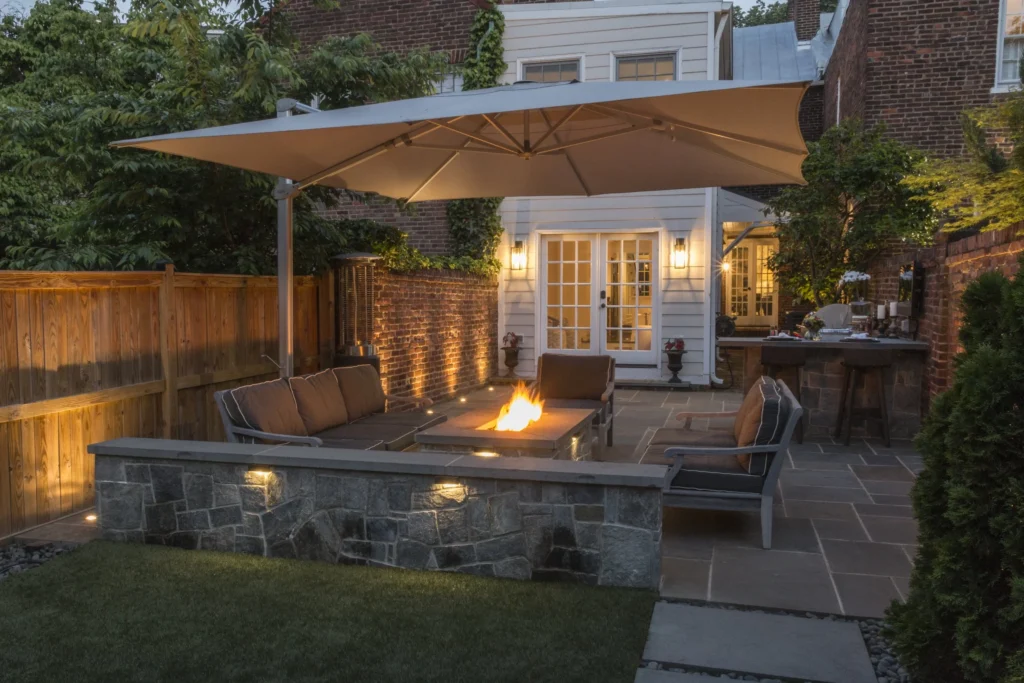 backyard fire pit under umbrella