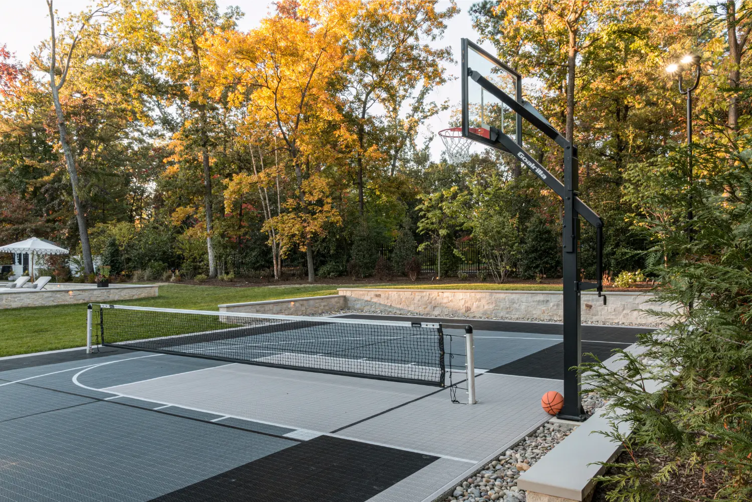 Sport Court Designed & Built in Northern Virginia includes a basketball hoop and tennis court