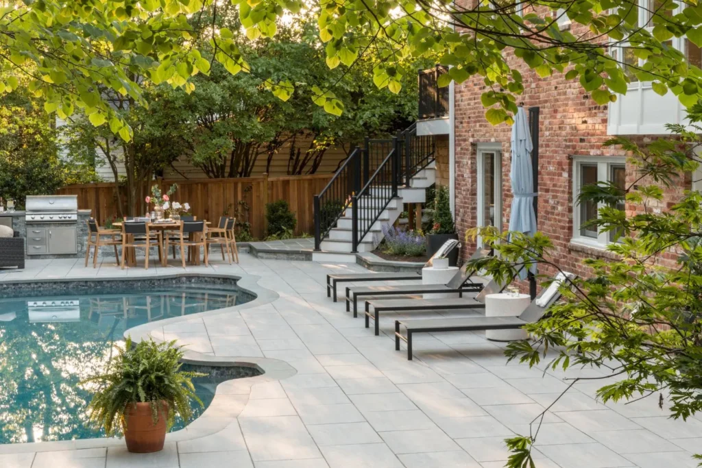 elevated deck adjoining pool patio