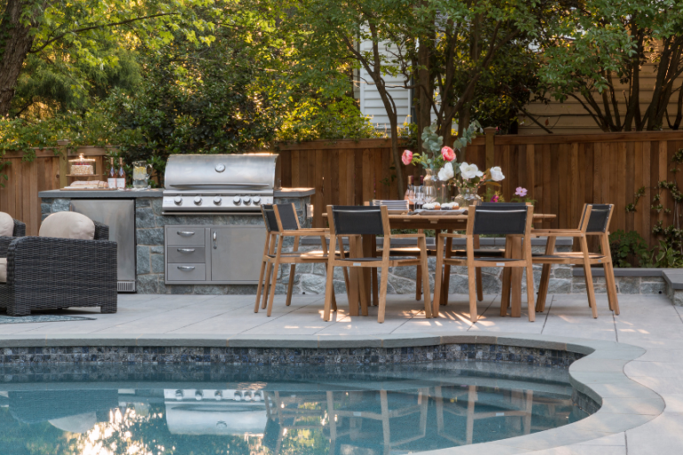 bbq and table near pool